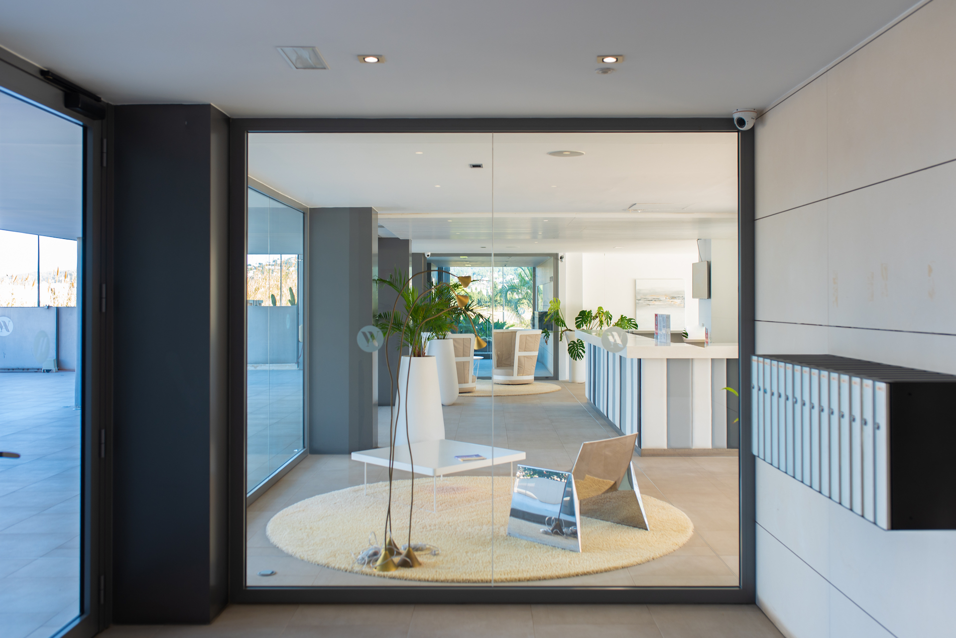 Resa Estates apartment for sale in Ibiza marina botafoch modern entrance the white angel.jpg